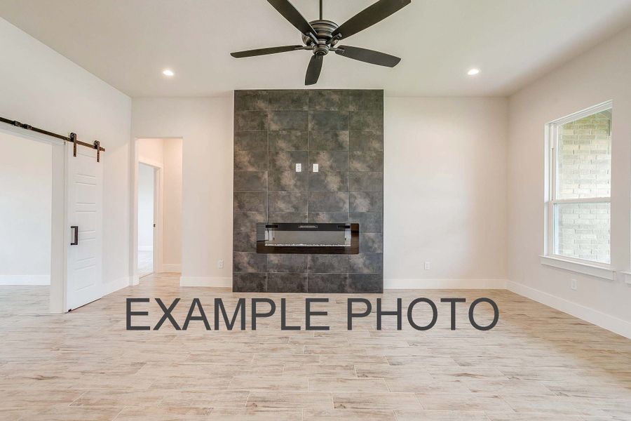 Representative furnished interior of a home built from the The Iris by Kenmark Homes in Rocky Top Ranch, Reno (Image 15).