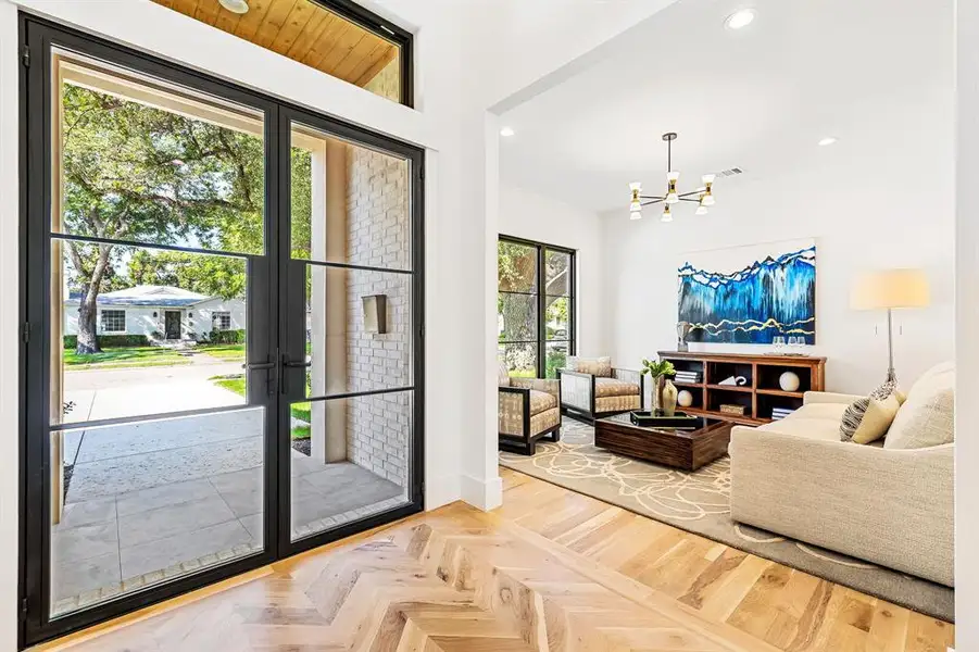 Doorway featuring recessed lighting and a chandelier Doorway featuring recessed lighting and a chandelier