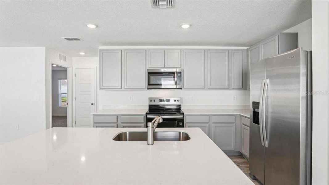 Furnished interior view inside a new home in Villamar, Winter Haven (Image 8).