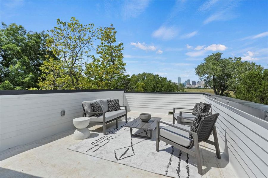 View of rooftop patio with outdoor lounge area