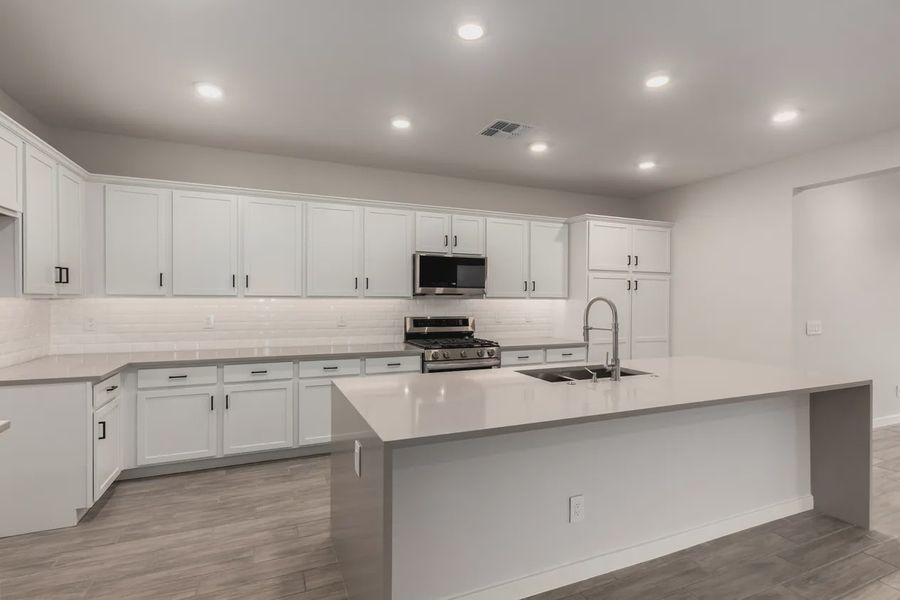 Furnished interior view inside a new home in Avanti at Granite Vista, Waddell (Image 6).