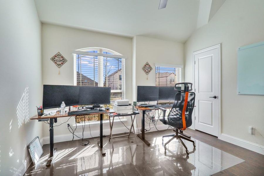 Office area featuring healthy amount of natural light and vaulted ceiling Office area featuring healthy amount of natural light and vaulted ceiling