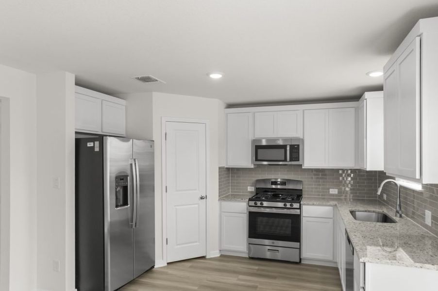 Representative furnished interior of a home built from the Pecan by Pacesetter Homes in Blanco Vista, San Marcos (Image 11).