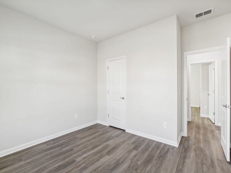 Secondary bedroom in the Chandler floorplan at 253 White Birch Lane in Angier, NC.