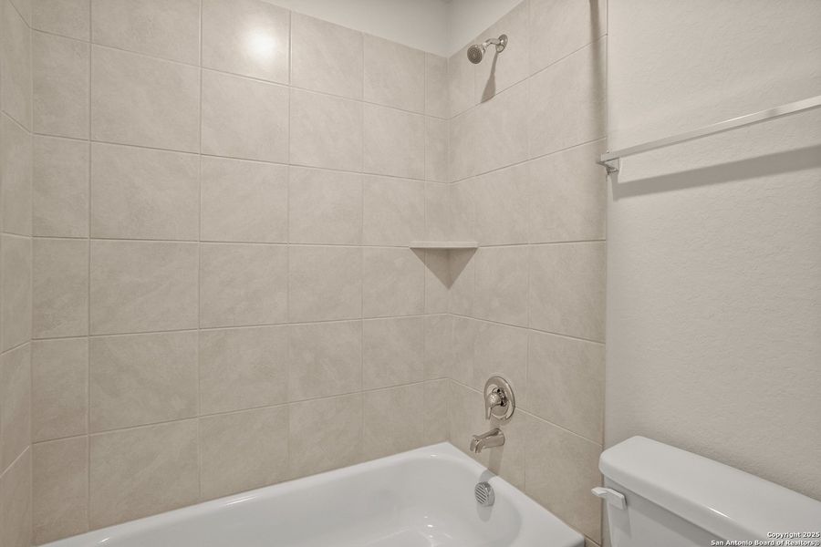 Furnished interior view inside a new home in Abbott Place, St. Hedwig (Image 11).