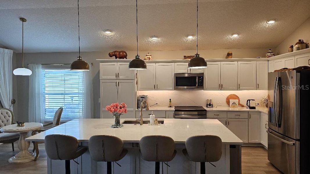 Furnished interior view inside a new home in , The Villages (Image 13).