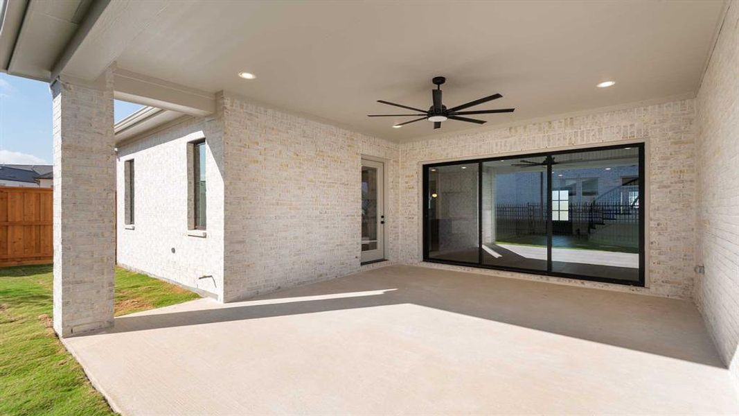 Exterior details and patio area of a home in Fields 60', Frisco (Image 3). Exterior details and patio area of a home in Fields 60', Frisco (Image 3).
