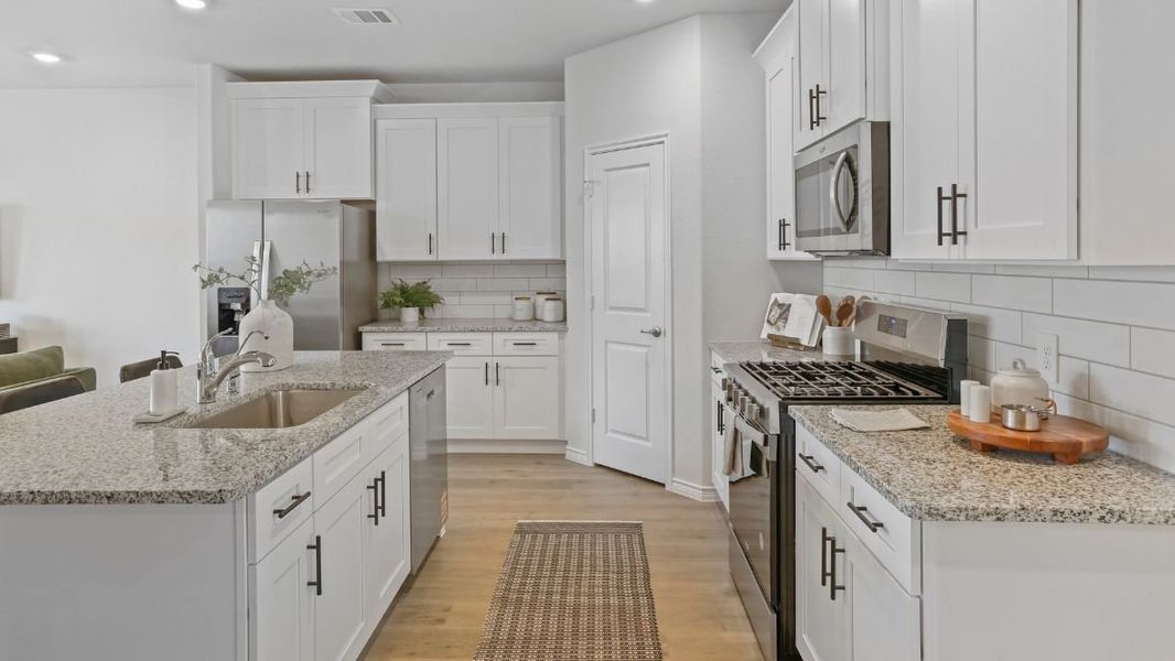 Furnished interior view inside a new home in Prairie Oaks, Oak Point (Image 4).