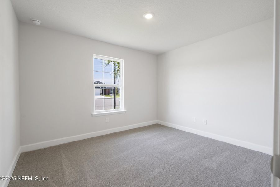 Spacious, unfurnished interior of a new home in Shadow Crest at Rolling Hills, Green Cove Springs (Image 12).