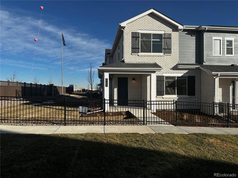 FRONT OF ACTUAL HOME AND YARD.