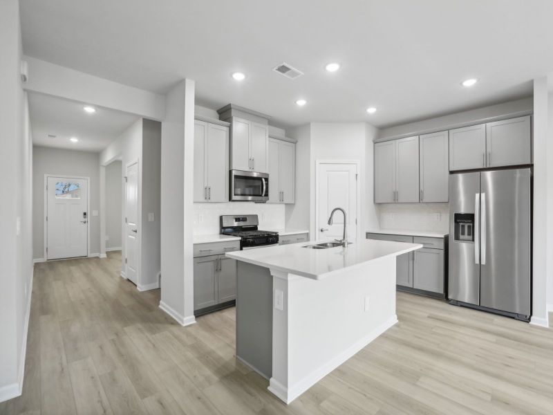 Kitchen in the Chatham floorplan at 250 White Birch Lane in Angier, NC.