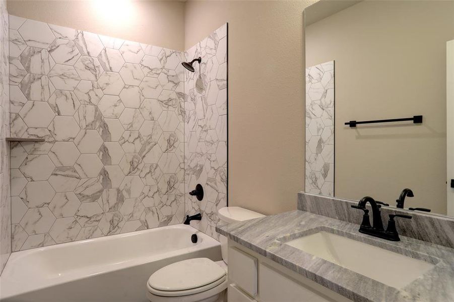 Full bathroom with washtub / shower combination and vanity Full bathroom with washtub / shower combination and vanity