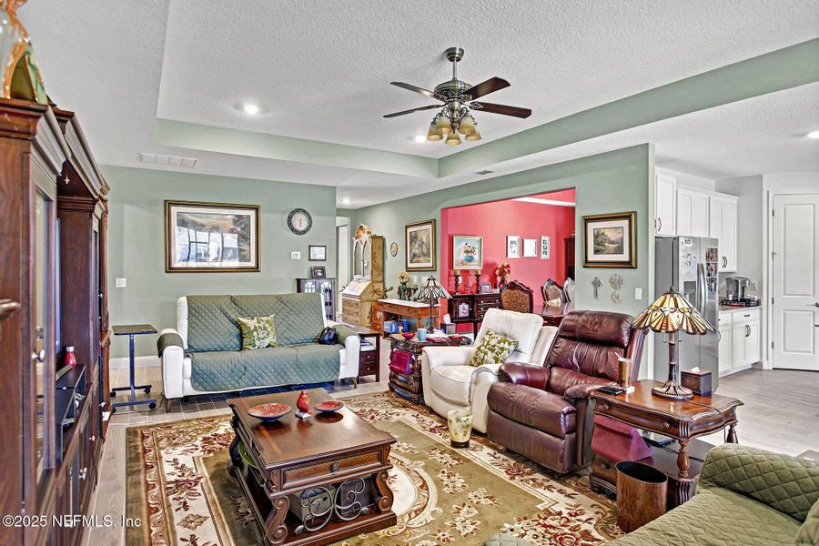 Furnished interior view inside a new home in Tributary: Lakeview at Tributary 60's, Yulee (Image 12).