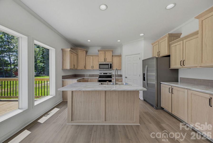 Furnished interior view inside a new home in , Newton (Image 6).