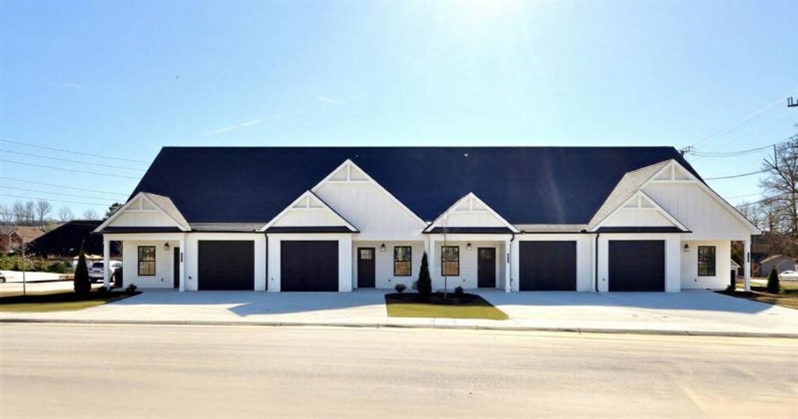 Front exterior of a new home in The Nassau, Chattanooga, TN, highlighting curb appeal (Image 17). Front exterior of a new home in The Nassau, Chattanooga, TN, highlighting curb appeal (Image 17).