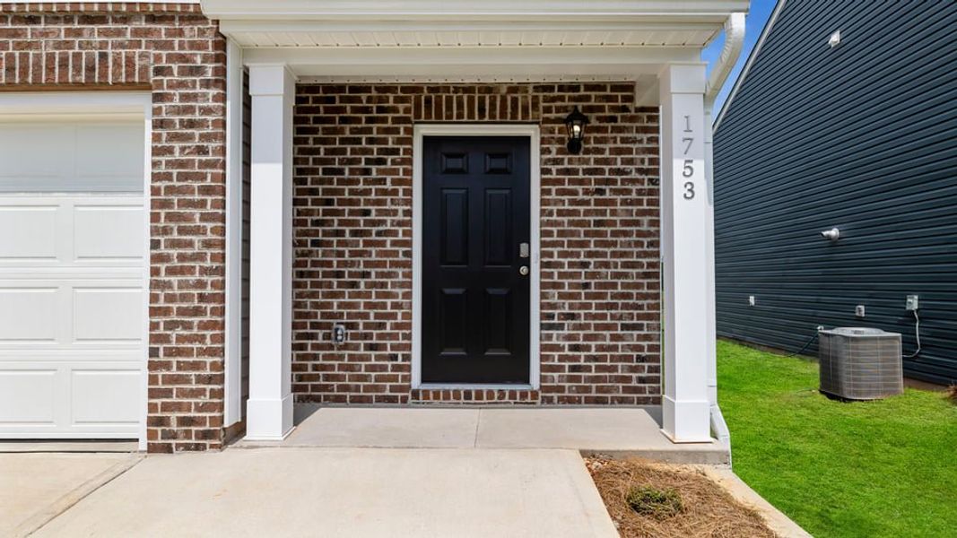 Front exterior of a new home in Durbin Meadows, Fountain Inn, SC, highlighting curb appeal (Image 2). Front exterior of a new home in Durbin Meadows, Fountain Inn, SC, highlighting curb appeal (Image 2).