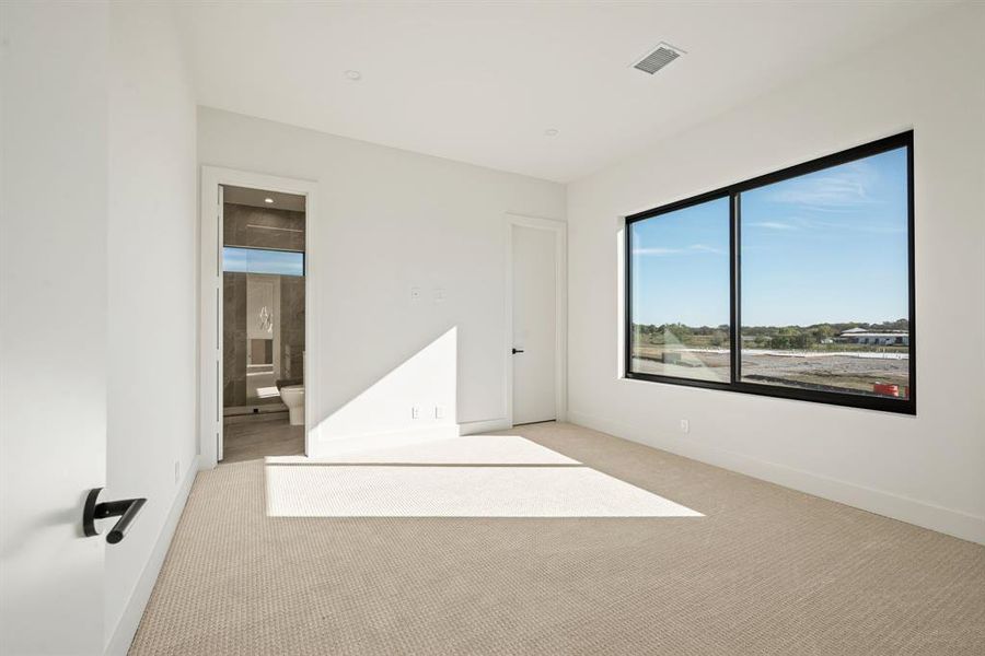 Secondary bedroom with ensuite bath access. Secondary bedroom with ensuite bath access.
