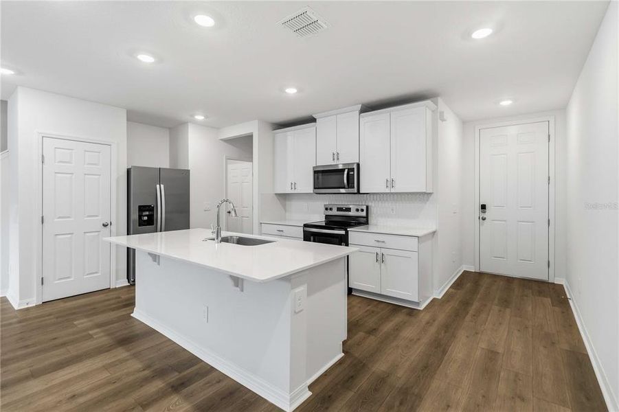 Furnished interior view inside a new home in , St. Cloud (Image 12).