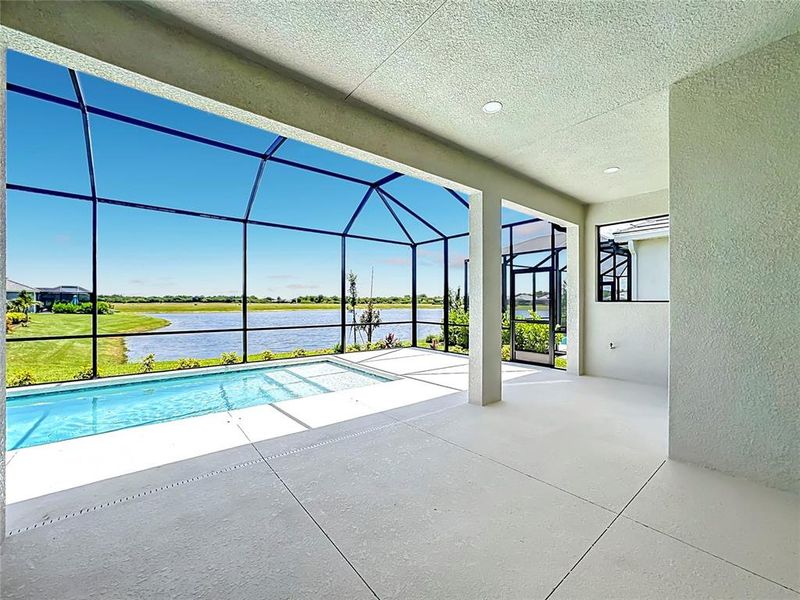 Exterior details and patio area of a home in Watercolor Place, Bradenton (Image 3).