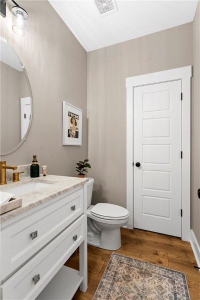 Powder Room. Staged for photography—furniture and décor not included