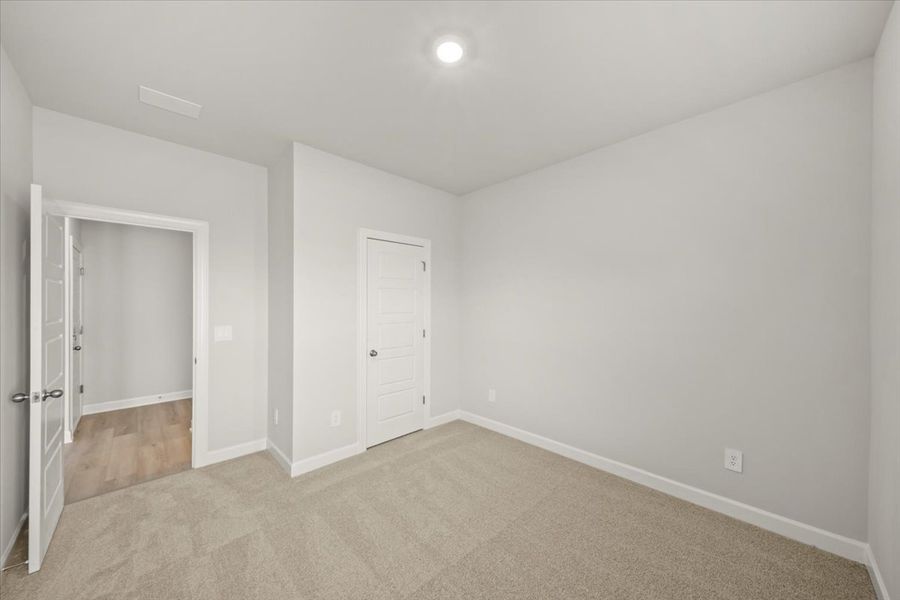 Spacious, unfurnished interior of a new home in The Farm at Wells Creek - Signature Collection, Gray Court (Image 19).