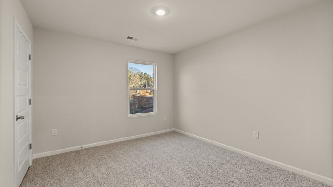 Spacious, unfurnished interior of a new home in Brooks Station, Dacula (Image 24).