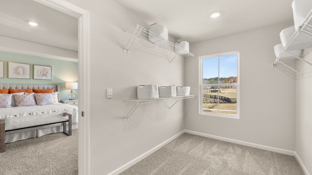 Representative furnished interior of a home built from the Denton TH by D.R. Horton in Brookland Commons, Monroe (Image 17).