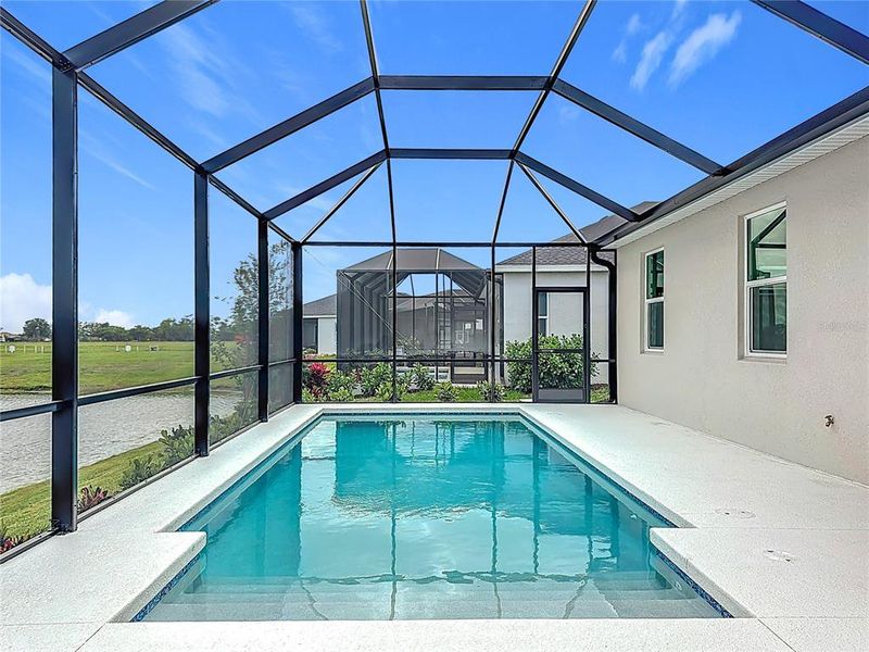 Exterior details and patio area of a home in , Parrish (Image 28).