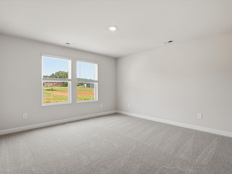 Spacious, unfurnished interior of a new home in Crossing at Abner Creek Townes, Greer (Image 12).