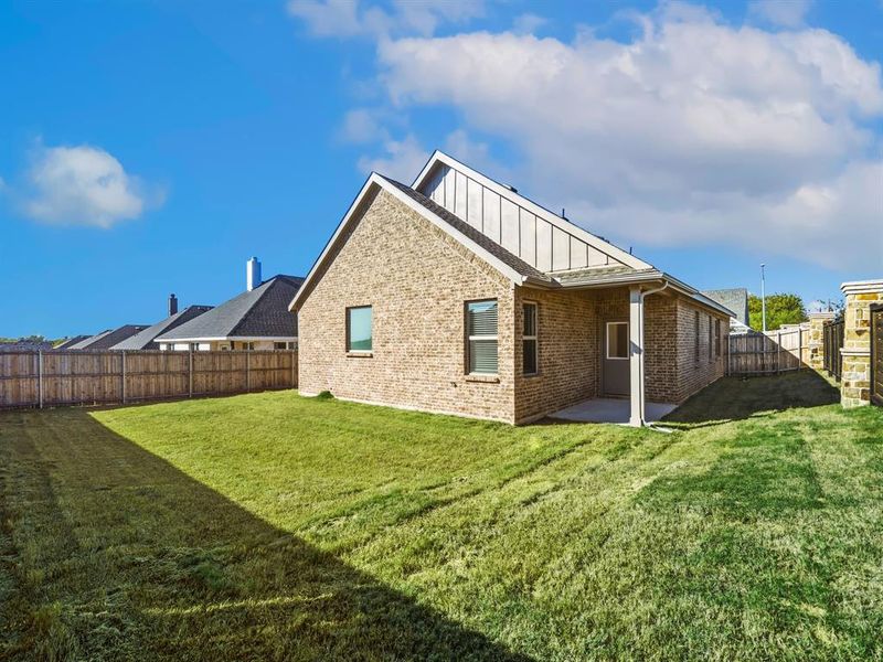 Exterior details and patio area of a home in Pecan Creek Crossing, Valley View (Image 16). Exterior details and patio area of a home in Pecan Creek Crossing, Valley View (Image 16).