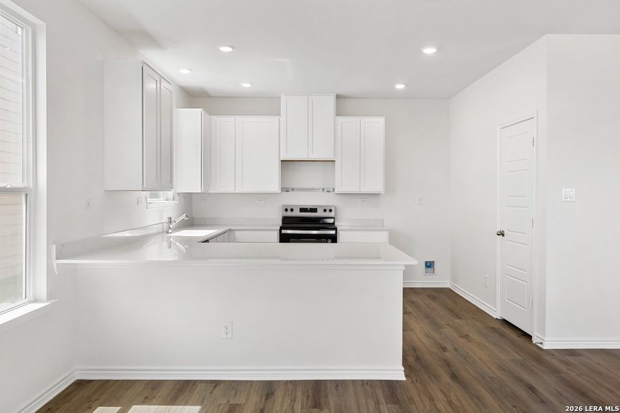 Furnished interior view inside a new home in Medina Crossing, Von Ormy (Image 7).
