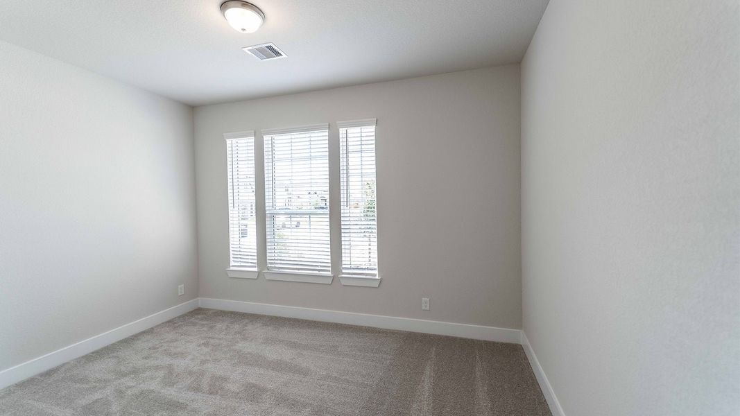 Spacious, unfurnished interior of a new home in Sunterra, Katy (Image 22).