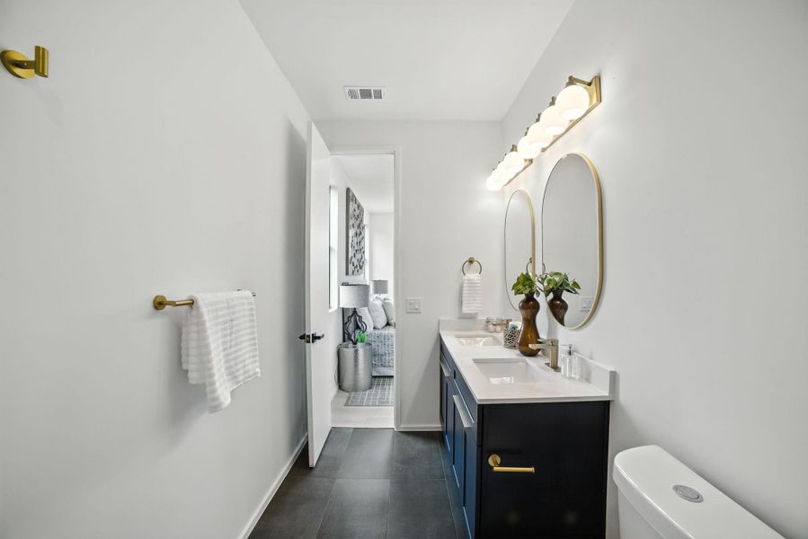 Bathroom with double vanity and ensuite bathroom Bathroom with double vanity and ensuite bathroom