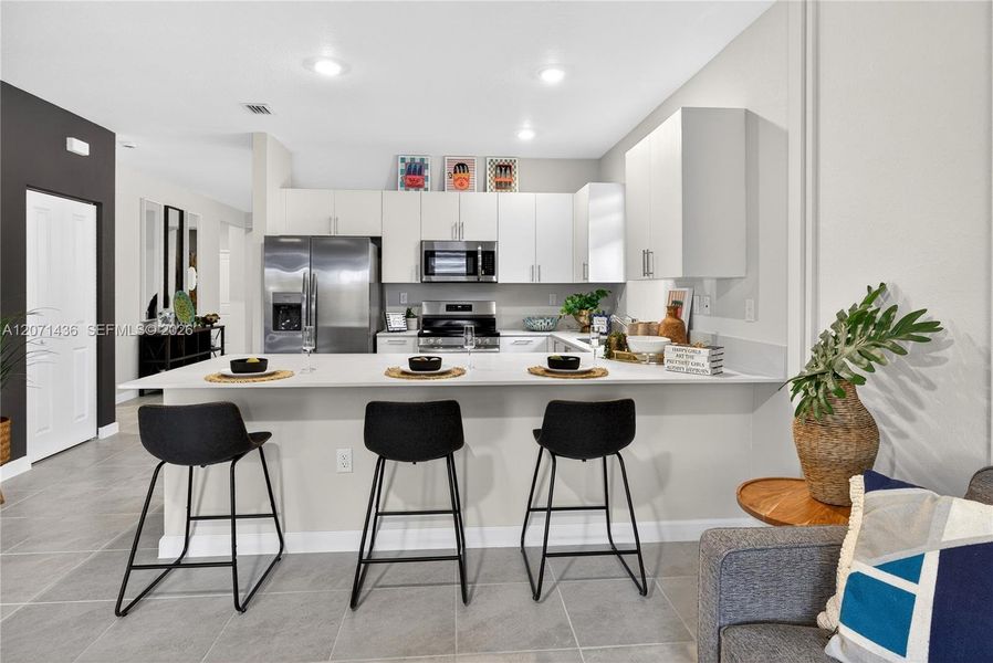 Furnished interior view inside a new home in Acacia Groves, Miami (Image 3).