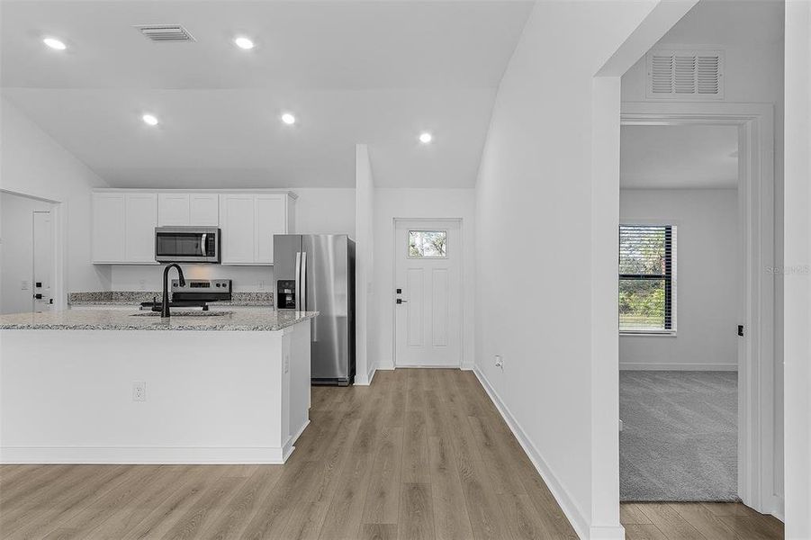 Furnished interior view inside a new home in , North Port (Image 4).