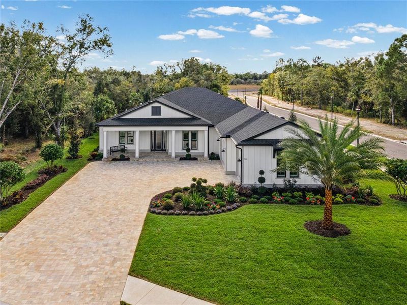Front exterior of a new home in , Tarpon Springs, FL, highlighting curb appeal (Image 2). Front exterior of a new home in , Tarpon Springs, FL, highlighting curb appeal (Image 2).