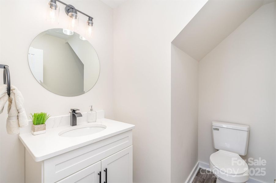 Downstairs 1/2 bath. Downstairs 1/2 bath.