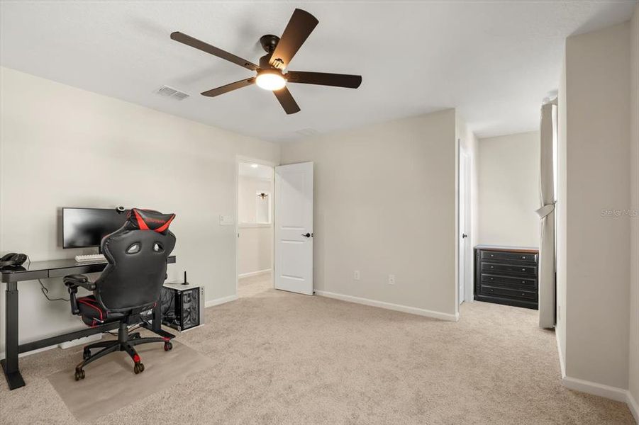 Furnished interior view inside a new home in Seasons at Lakeside Forest, Tavares (Image 13).