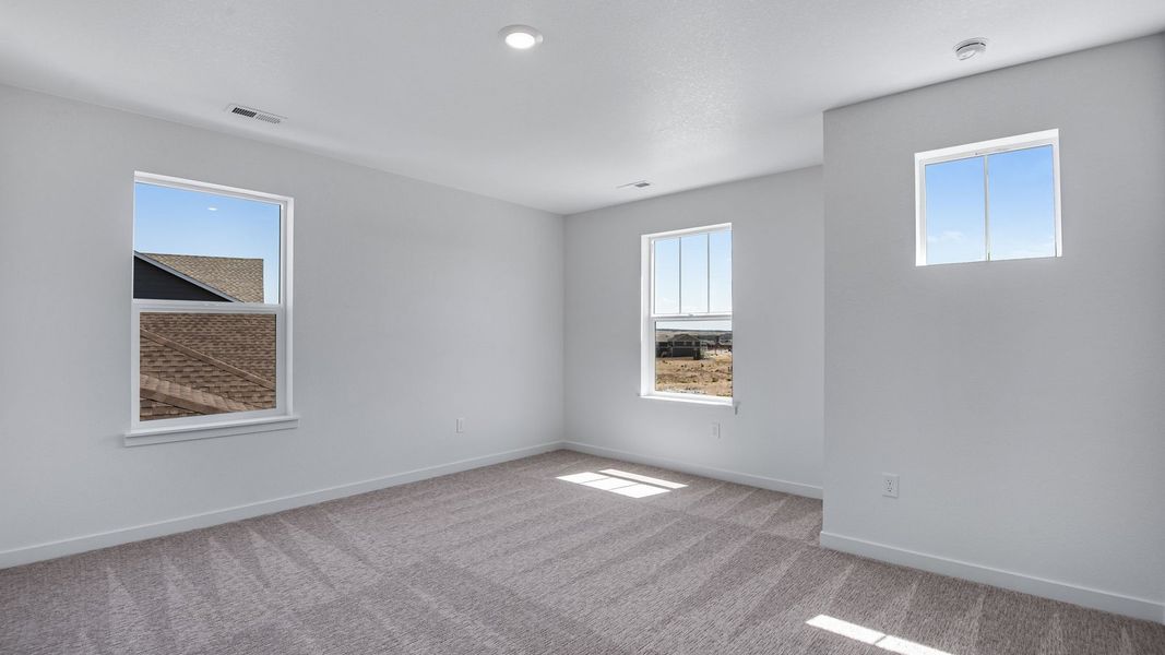 Spacious, unfurnished interior of a new home in Trails at Crowfoot, Parker (Image 43).