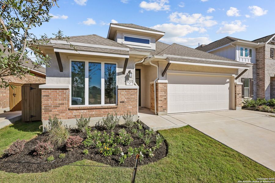 Front exterior of a new home in Stillwater Ranch 45', San Antonio, TX, highlighting curb appeal (Image 21).