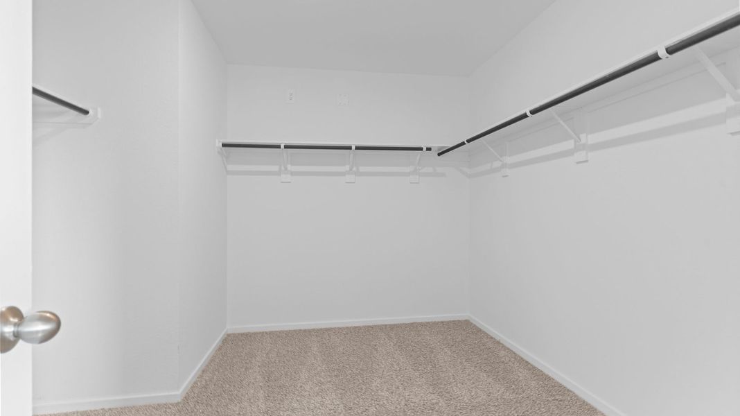 Spacious, unfurnished interior of a new home in Caldwell Crossing, Iowa Colony (Image 19).