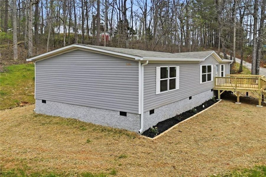 Exterior details and patio area of a home in , Ball Ground (Image 27). Exterior details and patio area of a home in , Ball Ground (Image 27).