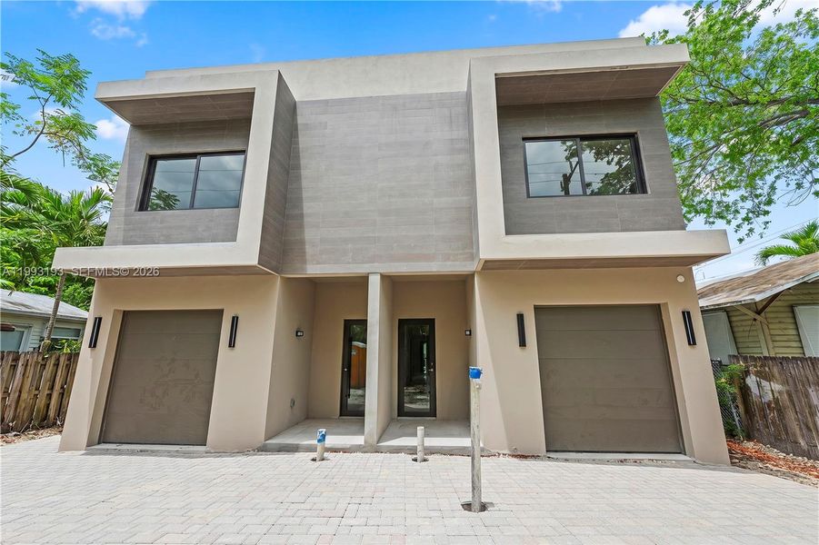 Front exterior of a new home in , Miami, FL, highlighting curb appeal (Image 2). Front exterior of a new home in , Miami, FL, highlighting curb appeal (Image 2).
