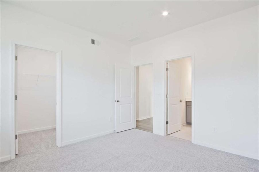 Spacious, unfurnished interior of a new home in The Paddocks at Doc Hughes, Buford (Image 33).