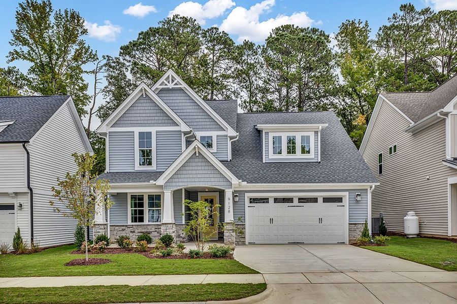 Representative exterior photo of a completed home built from the The Whitley by RobuckHomes in Windwater, Hampstead, NC (Image 32).