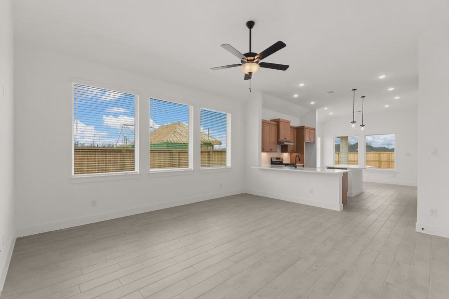 Representative unfurnished interior of a home built from the Pinehurst by Chesmar Homes in Riceland Alley Loads, Mont Belvieu (Image 18).