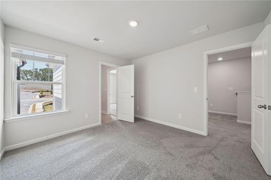 Spacious, unfurnished interior of a new home in Artisan Walk, Fairburn (Image 25).