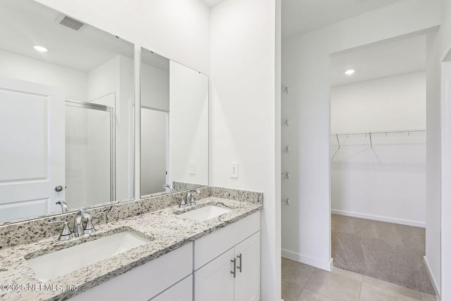 Furnished interior view inside a new home in Lakes at Bella Lago - Signature Series, Green Cove Springs (Image 10).