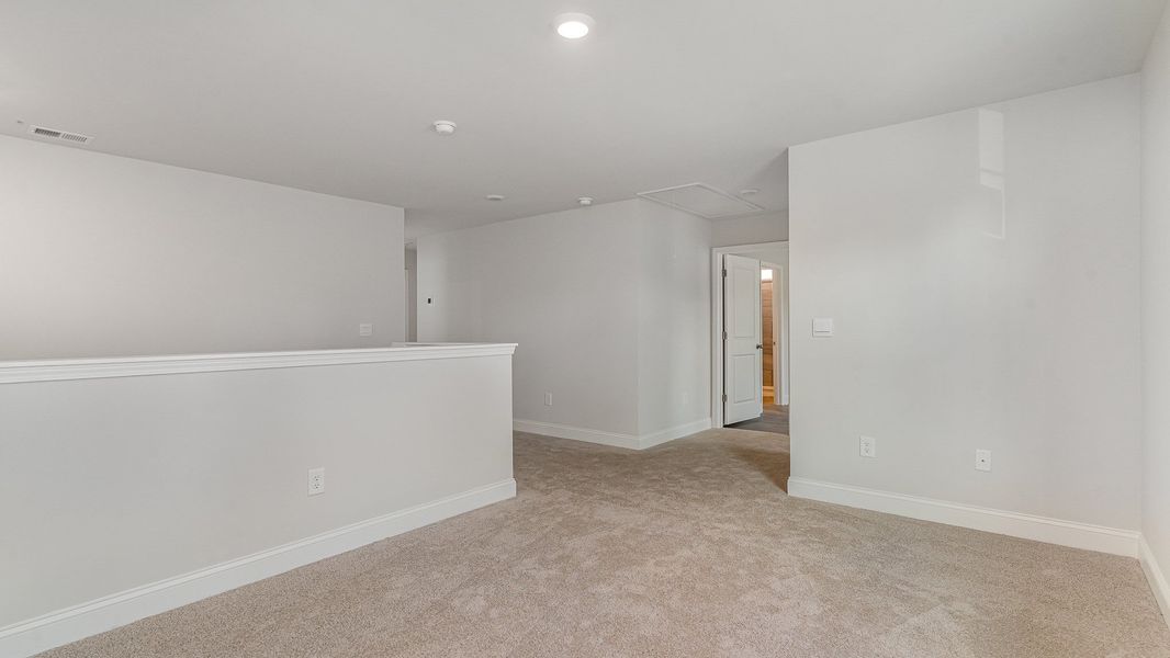 Spacious, unfurnished interior of a new home in The Preserve at Shaftesbury Glen, Conway (Image 10).