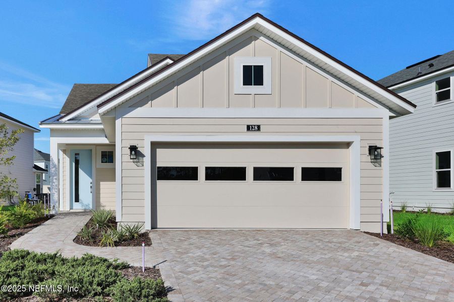 Front exterior of a new home in Crosswinds at Nocatee, Ponte Vedra Beach, FL, highlighting curb appeal (Image 27). Front exterior of a new home in Crosswinds at Nocatee, Ponte Vedra Beach, FL, highlighting curb appeal (Image 27).